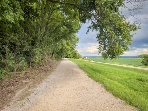 Katy Trail in rural Missouri near Bluffton in summer scenery. The Katy Trail is 237 mile bike trail converted from an old railroad.