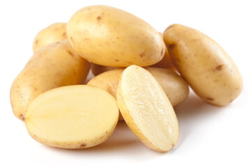 Raw potatoes, fresh uncooked staple food on white background.