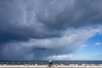 bicycle trip, stormy weather, clouds