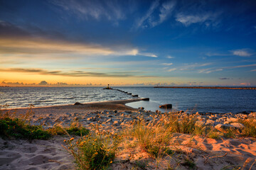 Amazing sunset on the beach at Baltic Sea in Gdansk, Poland