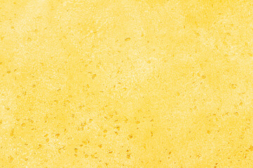 Yellow stone background, wall or floor. Abstract texture for graphic design or wallpaper
