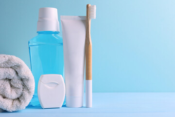Oral hygiene products on a colored background with space for text 