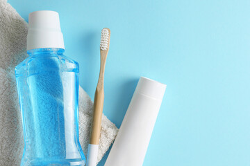 Oral hygiene products on a colored background with space for text 