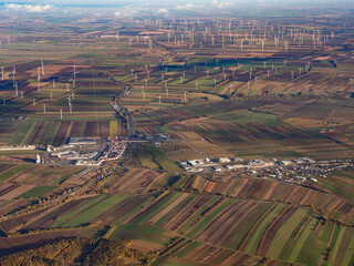 Aerial view of the many wind turbines that generate electricity in the vicinity of the Austrian capital - 633148109