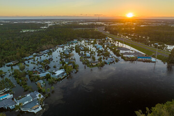 Heavy flood with high water surrounding residential houses after hurricane Ian rainfall in Florida...