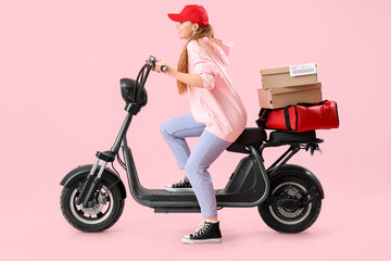 Fototapeta na wymiar Female courier driving scooter on pink background