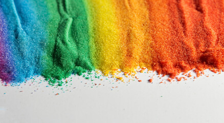 rainbow colored sand stripes colors like blue,red,green,orange,yellow,purple,pink,violet on white background in high resolution and sharpness © Marco