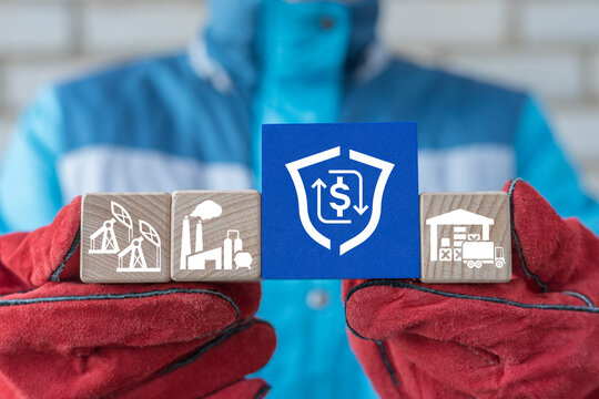 Worker or engineer holding colorful blocks with icons and icon: shield with money and round processing arrows. Concept of industrial profit insurance. Industry trust. Manufacturing investment.