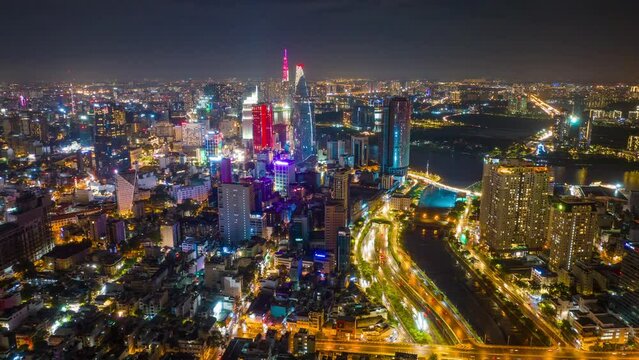 Hyperlapse Aerial view of beautiful night traffic and city lights in Ho Chi Minh City, Vietnam.