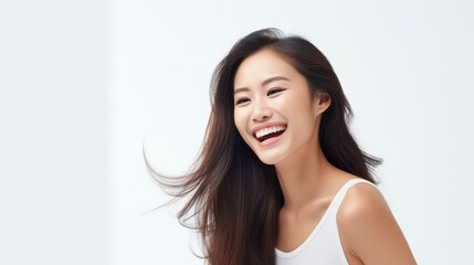 A closeup photo portrait of a beautiful young asian model woman laughing and smiling with clean teeth. used for a dental ad. isolated on white background,
