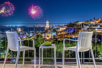 View of Puerto Vallarta city at night with fireworks