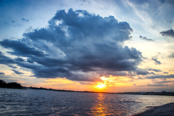 Fototapeta premium sunset over the sea, Padma river, Kushtia, Cloudy Sky, Beautiful Sky, Dusk, Ganga river, Goria River, Kushtia