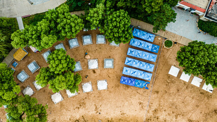 Fototapeta na wymiar Beaches and Tents-Scenery of Nanhu Park in Changchun, China in Summer