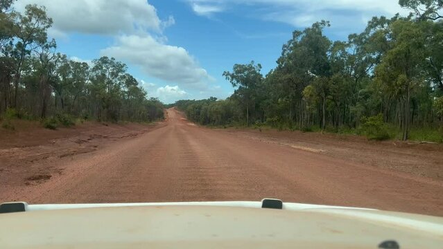POV (point of view) Car driving on Peninsula Development Road DPR Cape York Queensland, Australia.