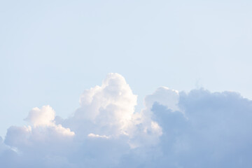 Mysterious colored clouds floating in the sky at sunset.