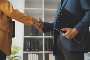 Business woman offer and give hand for handshake in office. Successful job interview. Apply for loan in bank. Salesman, bank worker or lawyer shake for deal, agreement or sale. Increase of salary.