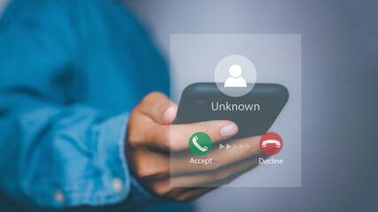 Businessman answering to incoming from an unknown caller. Phone call from unknown number. Scam,...