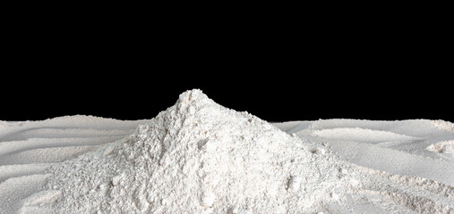 Background with flour. Pile of whole grain flour on dark background.