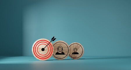 Red dartboard and black arrow with human icon for customer focus target group and customer relation...