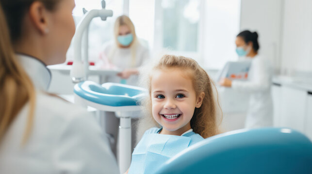 Little girl sitting in the dentists office