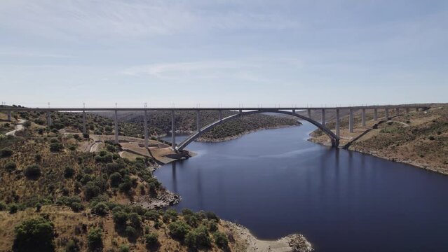Aerial View Of The Viaduct For High-Speed Train Over The Almonte River in Caceres, Extremadura. Push Forward Shot