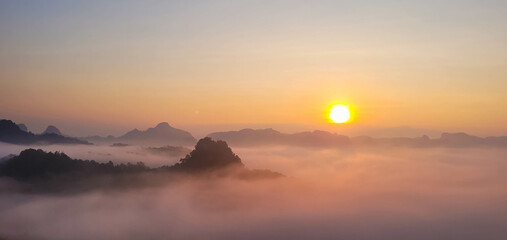 Sunrise with misty sea
