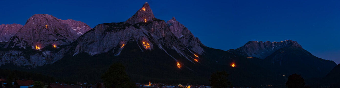 High resolution stitched alpine view with the mountain fires of the Tyrolean Zugspitz Arena near Ehrwald, Reutte, Tyrol, Austria