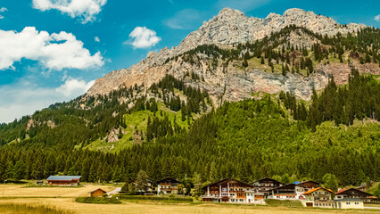 Fototapeta na wymiar Alpine summer view near Nesselwaengle, Tannheimer Tal valley, Reutte, Tyrol, Austria