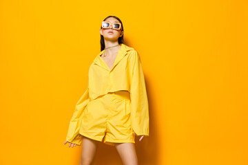 Fototapeta premium yellow woman beautiful young girl fashion lovely sunglasses attractive trendy lifestyle