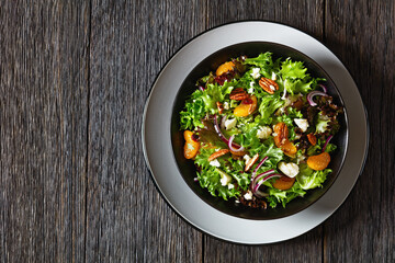 Mandarin Orange Salad in black bowl, top view