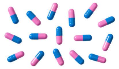 Magenta and blue capsules isolated on white background, top view.