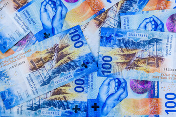 Naklejka premium Background of the one hundred francs banknotes. Swiss money