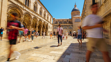 Old town Dubrovnik, Croatia, street view, crowds of tourists walking through the streets, medieval architecture, bright sunny day, travel - obrazy, fototapety, plakaty