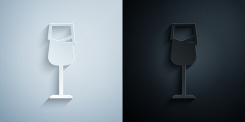 Paper cut Wine glass icon isolated on grey and black background. Wineglass sign. Paper art style. Vector