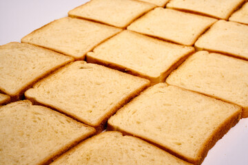 Slices of toast bread on a white background.