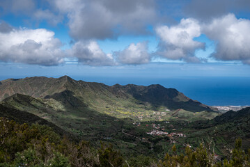 Summer landscape of green mountains and blue sky