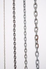 Metal chains on a white background.
