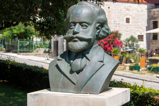 bust of Miho Klaic in the Park of Heads Zadar in the state of Zadar Croatia - Powered by Adobe