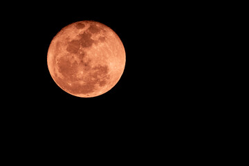 Close up on full moon with dark sky