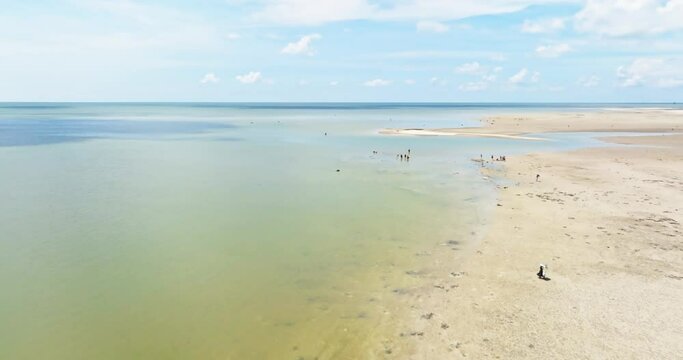 Aerial view of the beautiful silver beach in Beihai, Guangxi, China under the blue sky and white clouds,Quiet and empty