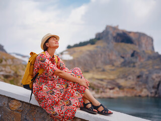 Nice Happy Female Enjoying Greek Islands. Travel to Greece, Mediterranean islands outside tourist...