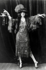A stylish transgender woman exudes elegance in vintage attire.