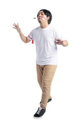 Indonesian men celebrate Indonesian independence day on 17 August with a marbles race using a spoon