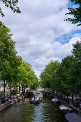 Fototapeta na wymiar On a canal of Amsterdam.
