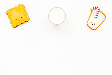 Homemade funny biscuits with milk for kids, top view. Breakfast with milk