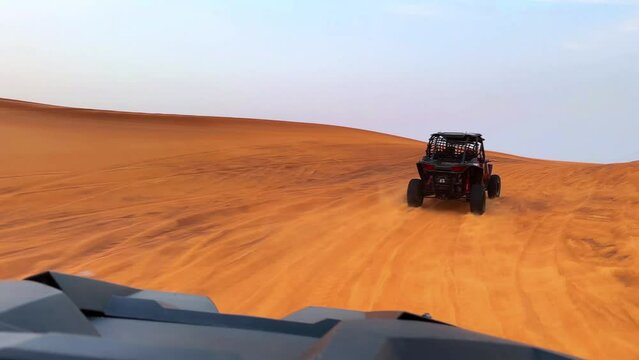 driving on the desert, extreme sand riding, buggy ride in the desert, desert sunset
