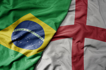 big waving realistic national colorful flag of brazil and national flag of england . - obrazy, fototapety, plakaty