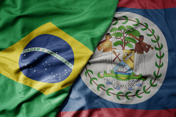 big waving realistic national colorful flag of brazil and national flag of belize .