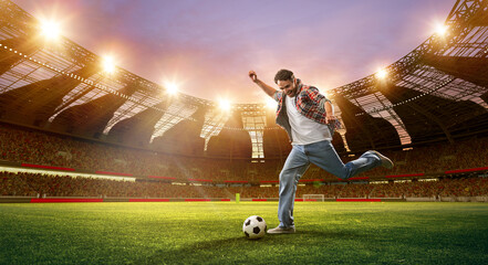 Fototapeta na wymiar Emotional man hitting football ball on open air arena with flashlights. Netting and match. 3d render. Concept of sport, fan, betting and finances, gambling, bookmaker