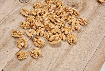 Delicious nuts and dry fruits on the background, close up style, in the plate still life.